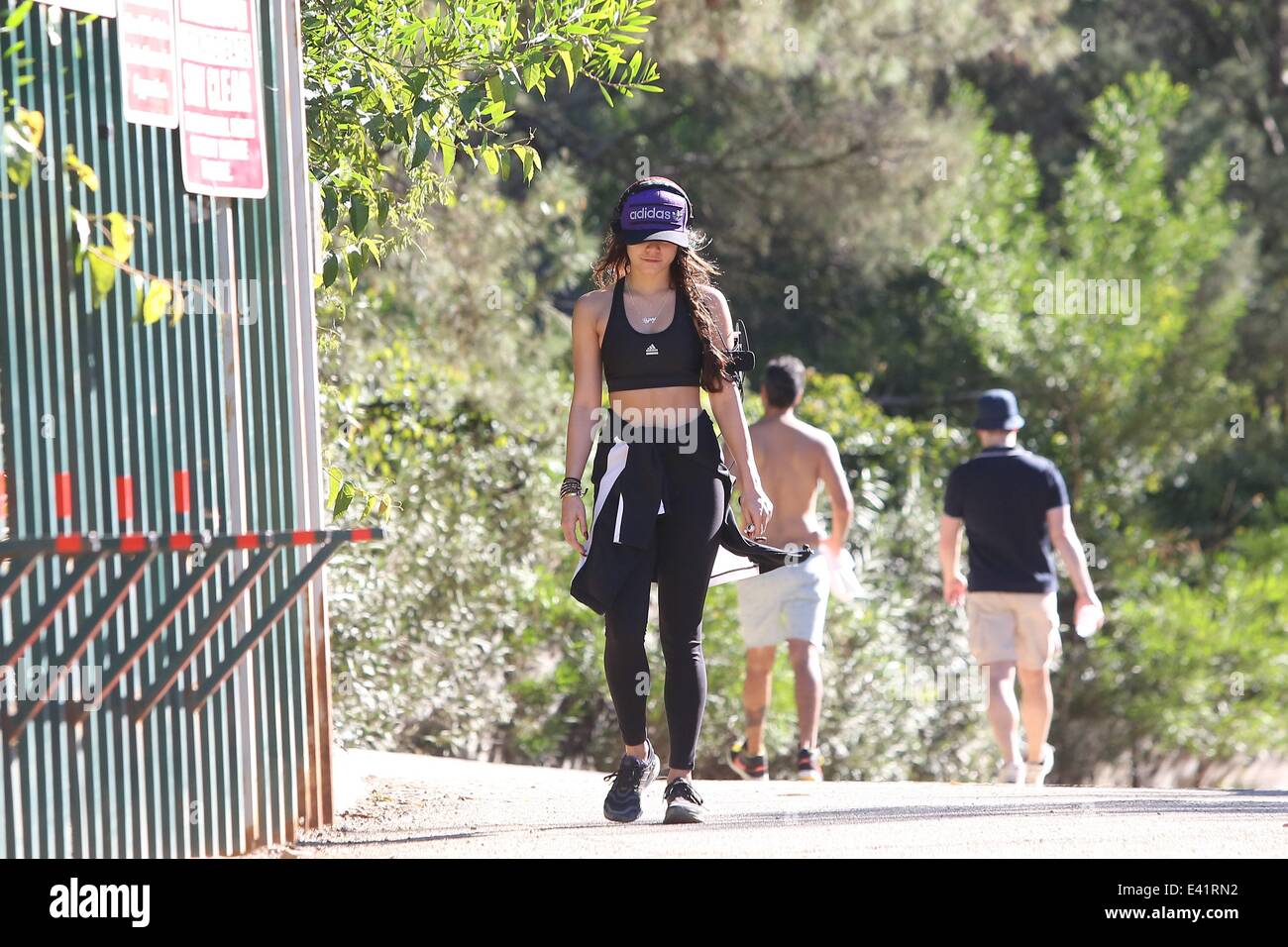 Vanessa Hudgens wearing adidas sportswear goes jogging at Ranyon Canyon 