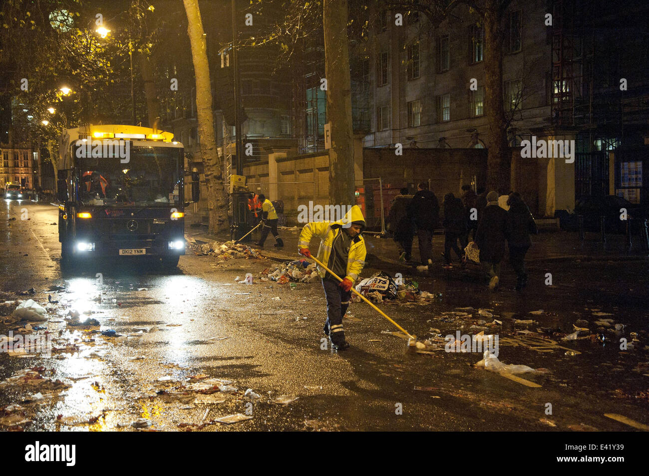 The clean up operation begins after London's spectacular 2013 New Year ...