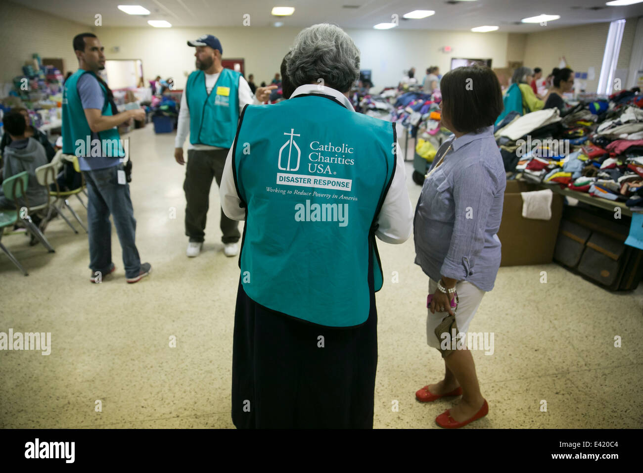 volunteers at Catholic Charity shelter in McAllen, Texas. Surge of immigrants from Central America crossed  Texas-Mexico border Stock Photo