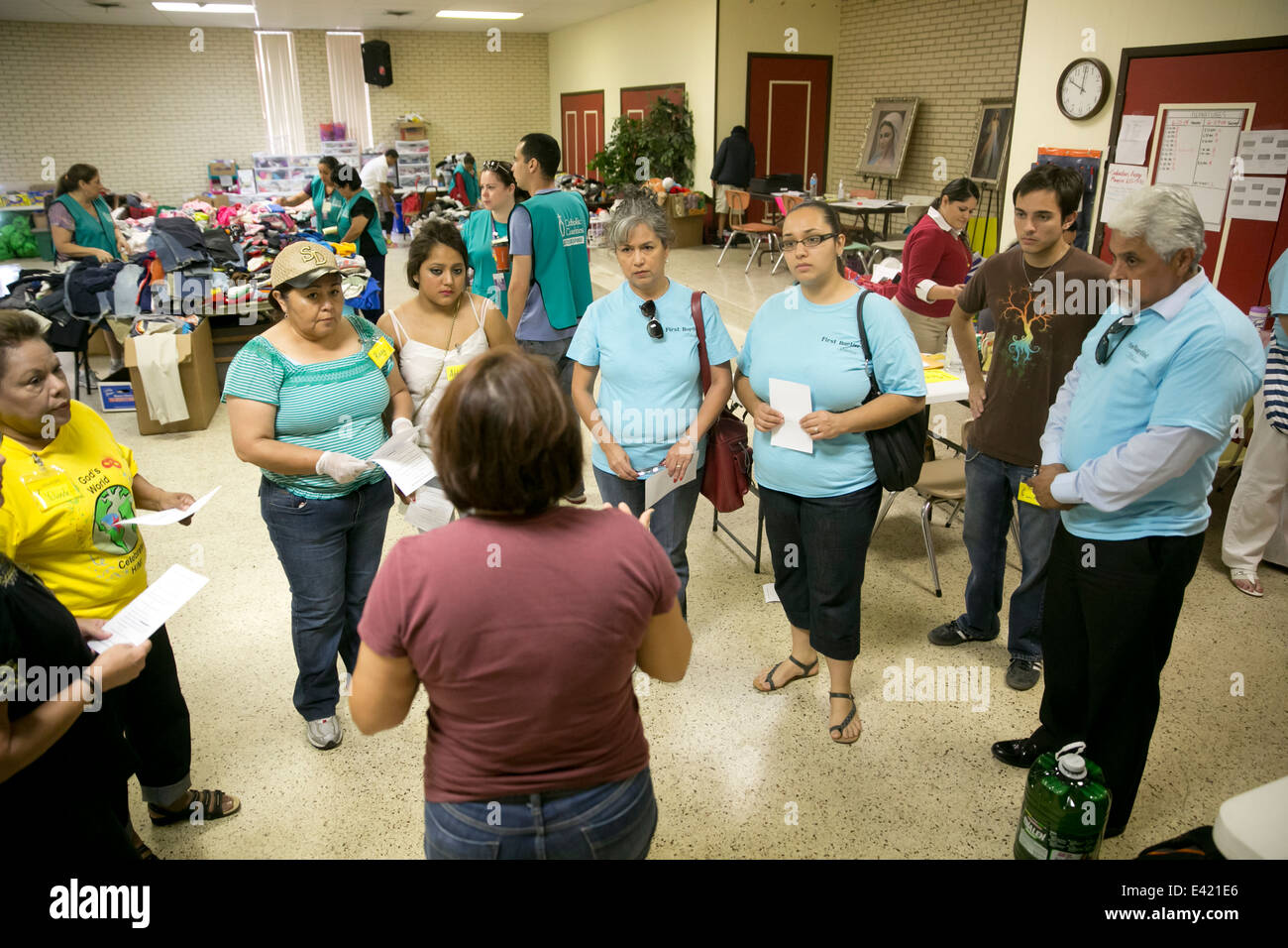 volunteers at Catholic Charity shelter in McAllen, Texas. Surge of immigrants from Central America crossed  Texas-Mexico border Stock Photo