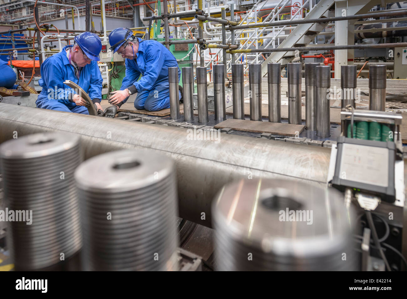 Engineers working on turbine housing repair during power station outage Stock Photo