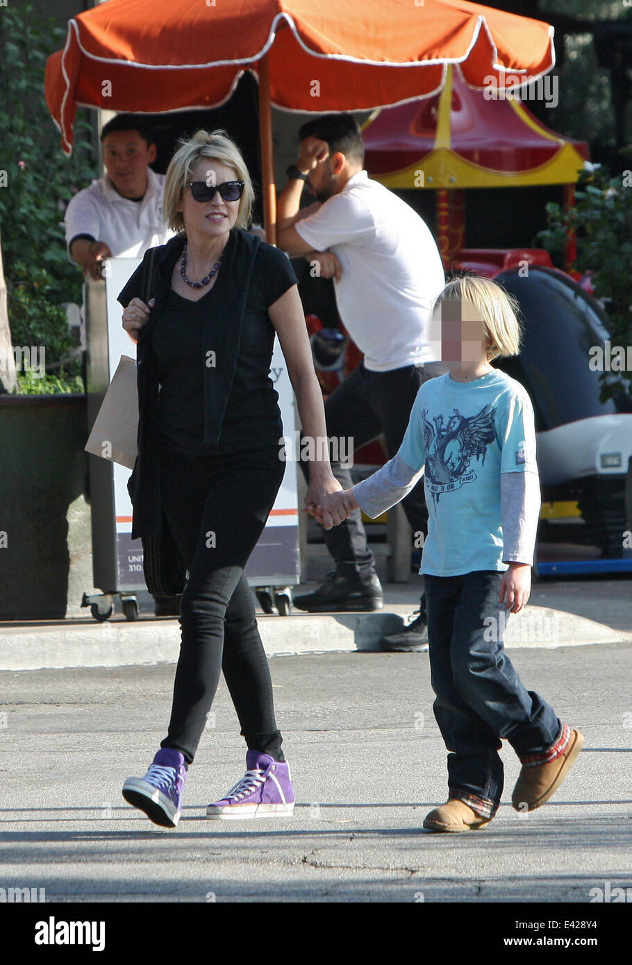 Sharon Stone out shopping treating her son at Tom's Toys Featuring ...