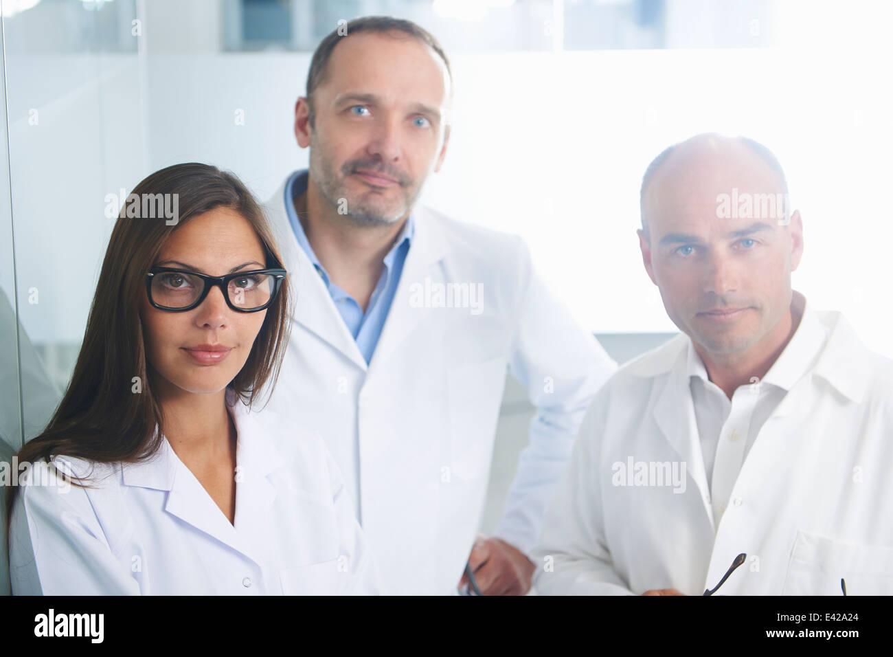 Doctors posing for camera Stock Photo