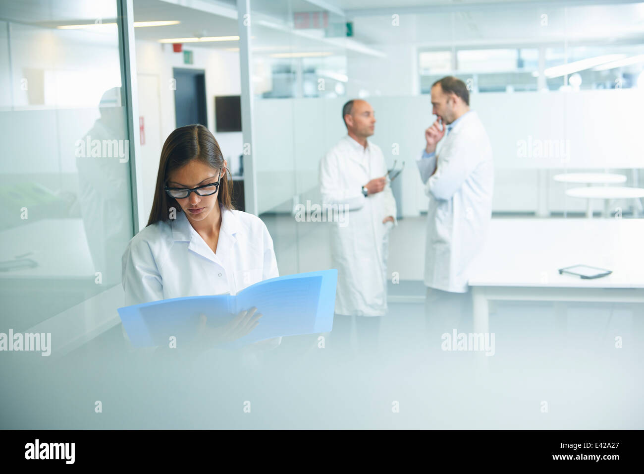 Doctors at work in office Stock Photo