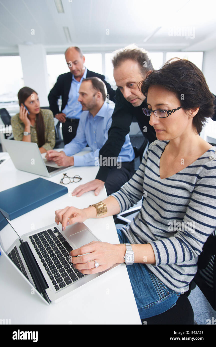 Businesspeople in brainstorming meeting Stock Photo