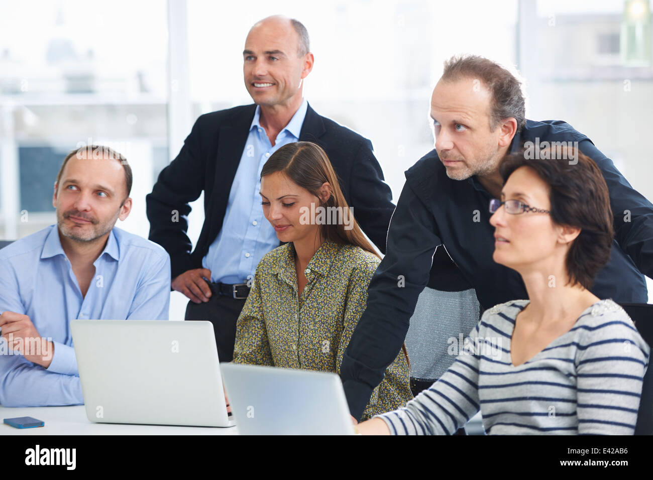 Businesspeople in brainstorming meeting Stock Photo