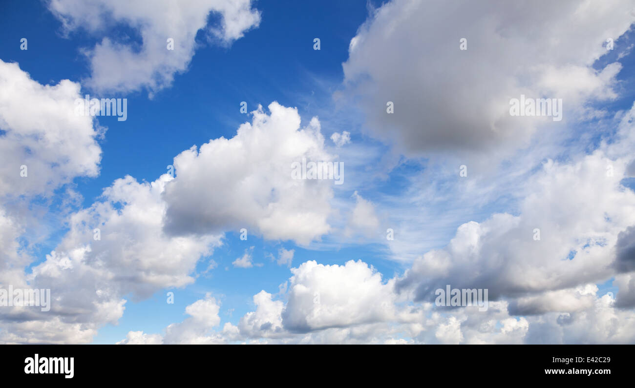Bright blue sky panoramic background with white clouds Stock Photo