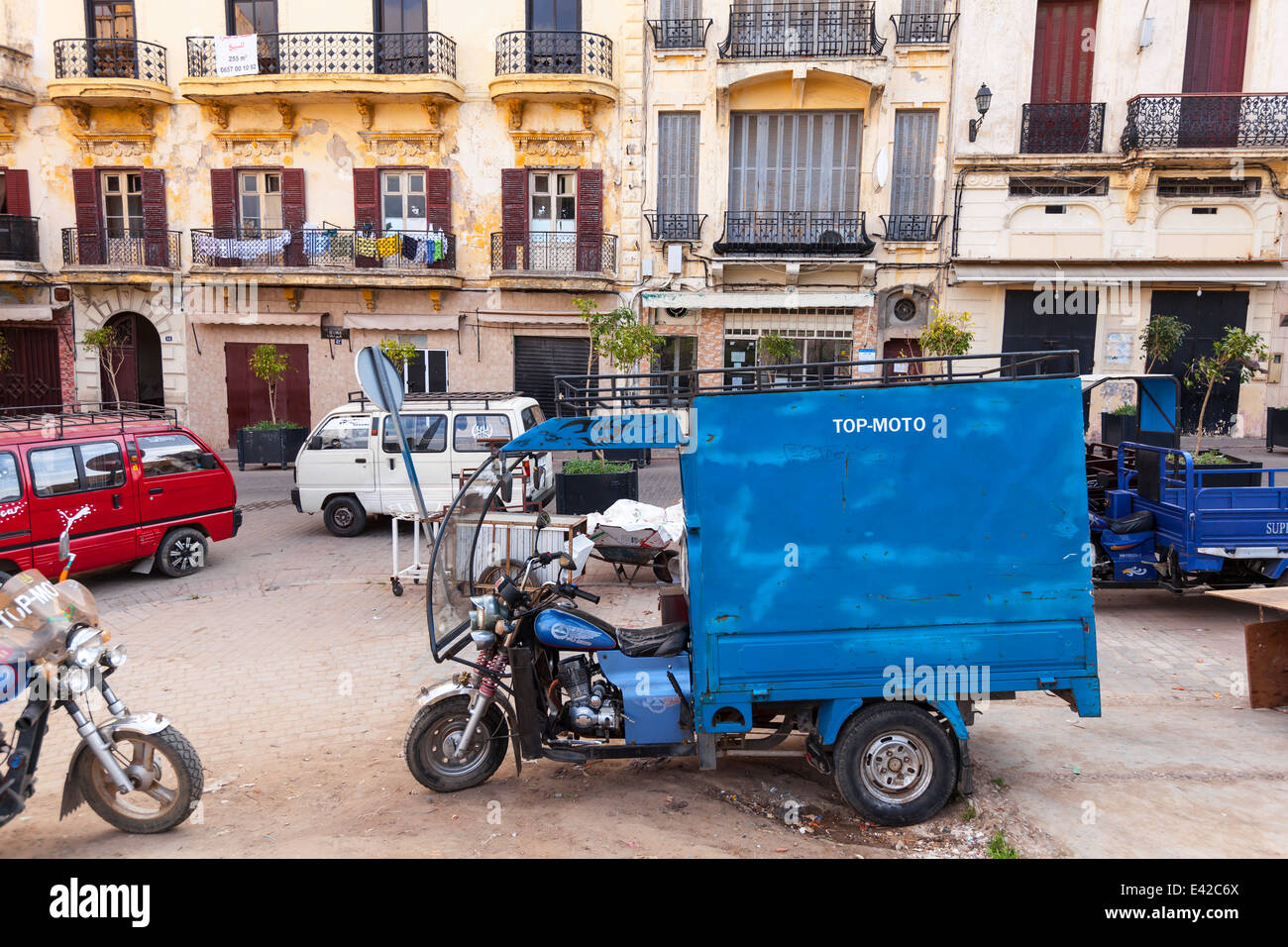 TANGIER, MOROCCO - MARCH 22, 2014: old blue tricycle cargo bike on the street of  Tangier Stock Photo