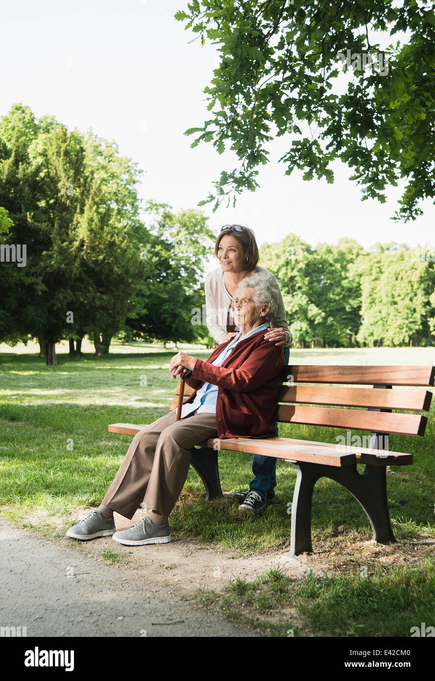 Mature woman on park bench hi-res stock photography and images - Alamy