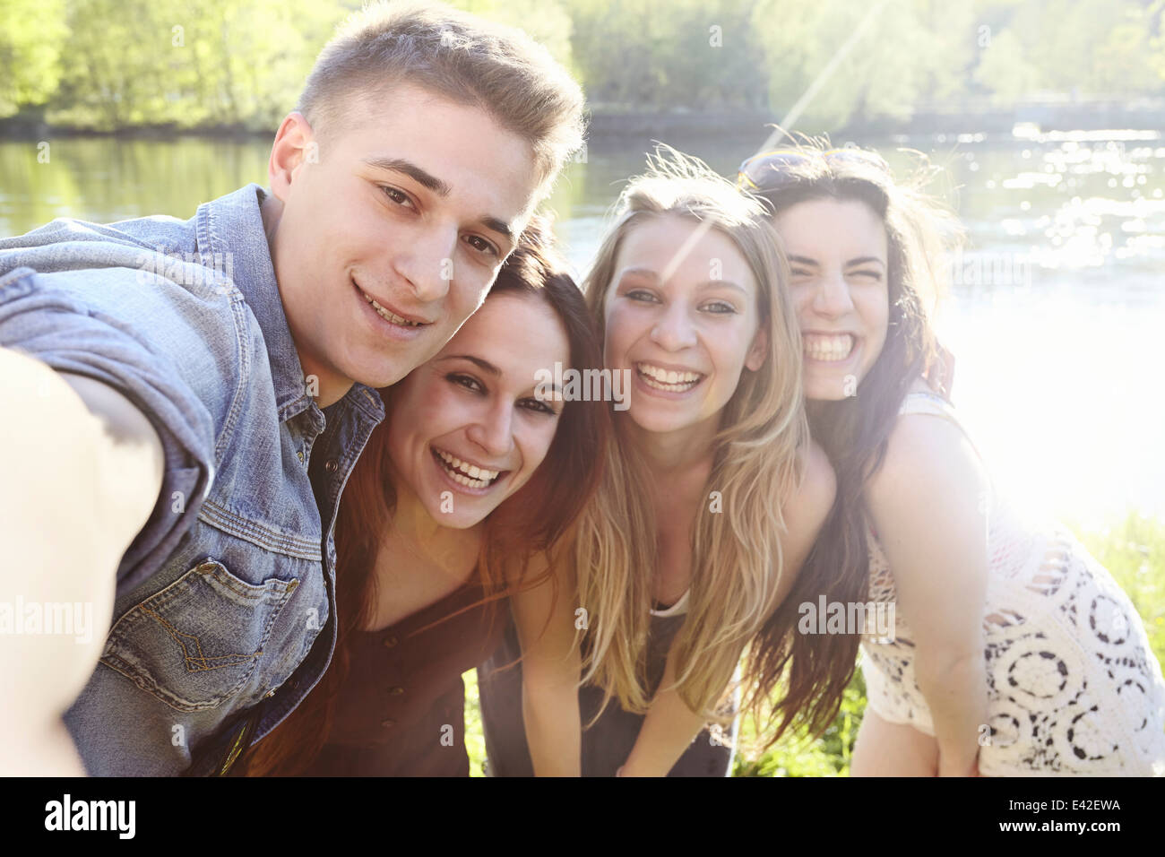 Group of friends in sunlight, posing Stock Photo