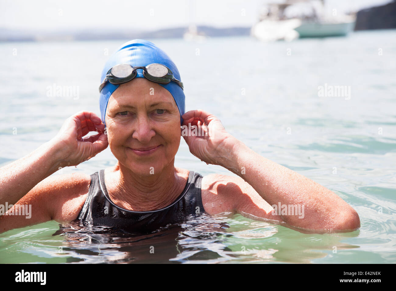 Portrait of senior woman swimmer in sea Stock Photo - Alamy