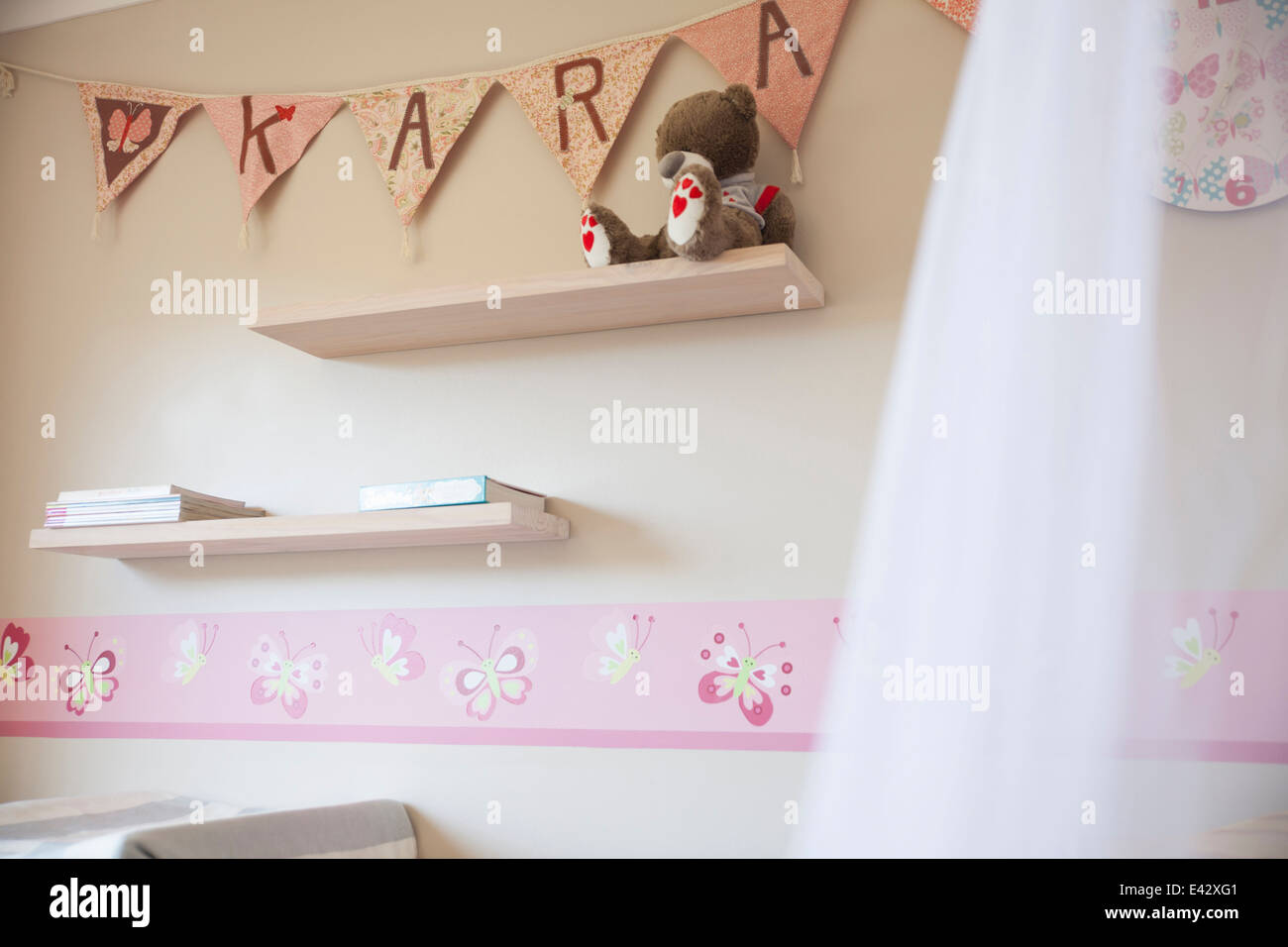 Decorated pink nursery with name on bunting Stock Photo