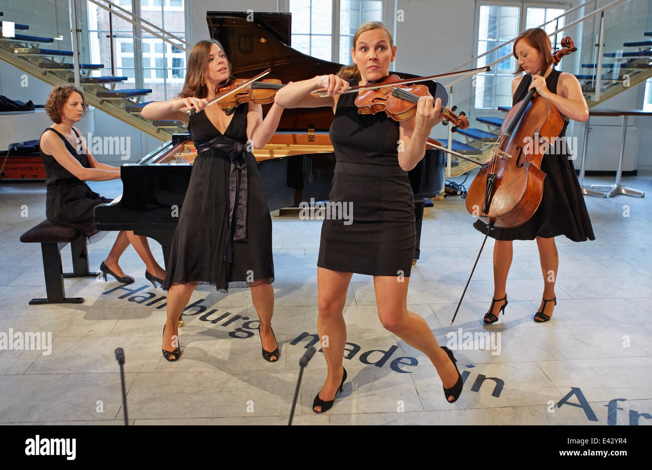 The musicians of the Hamburg based classical music quartet 'Salut Stock ...