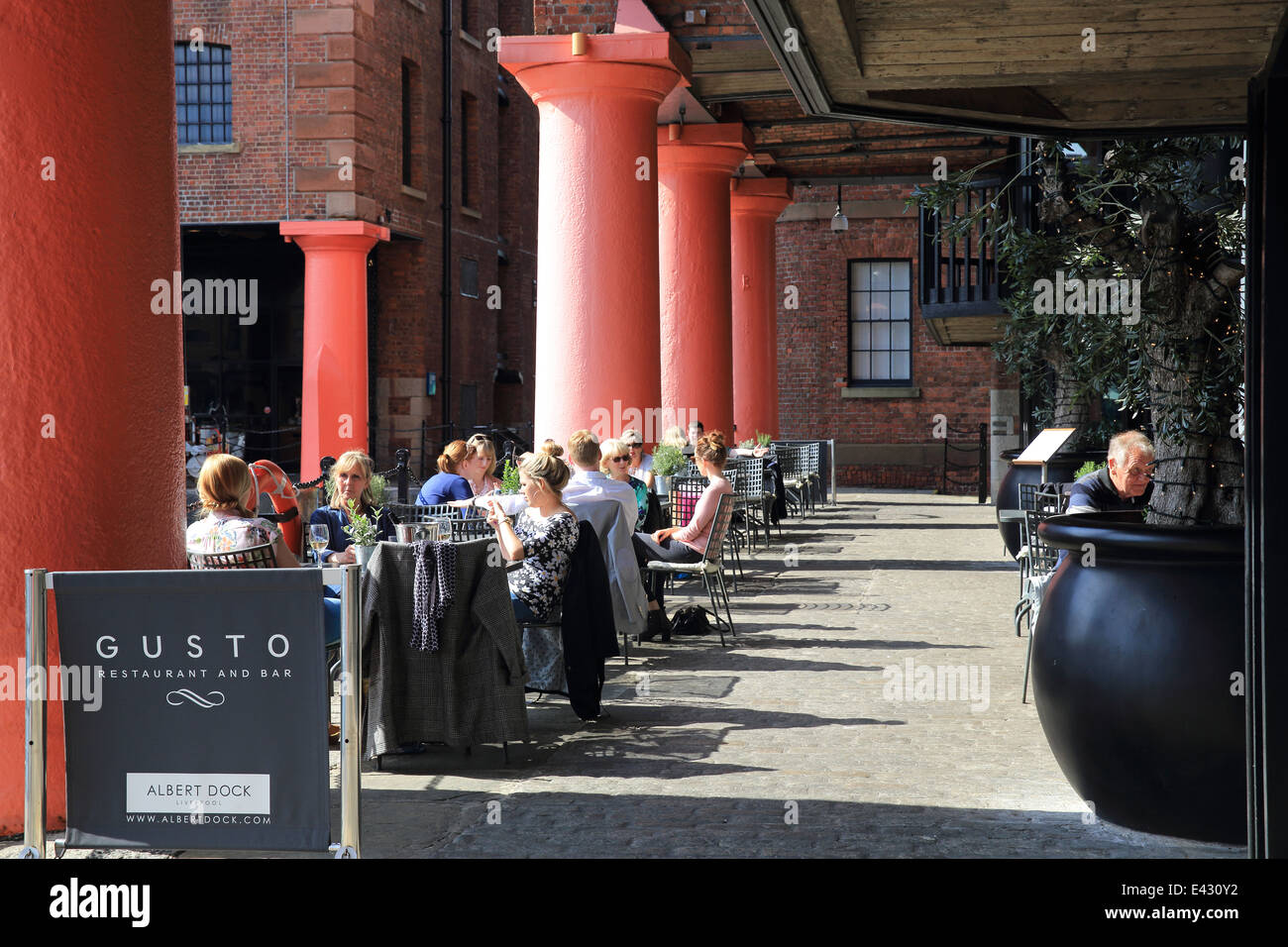 Trendy restaurant Gusto, on a summer's day on the Albert Dock, in Liverpool's famous, historic waterfront, England, UK Stock Photo