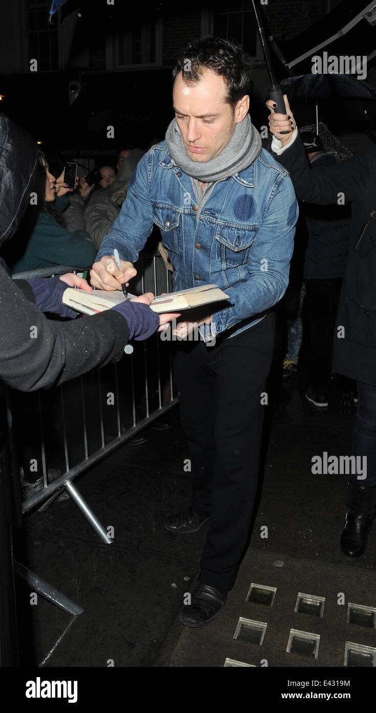 Jude Law leaving the Noel Coward Theatre in a denim jacket after his ...