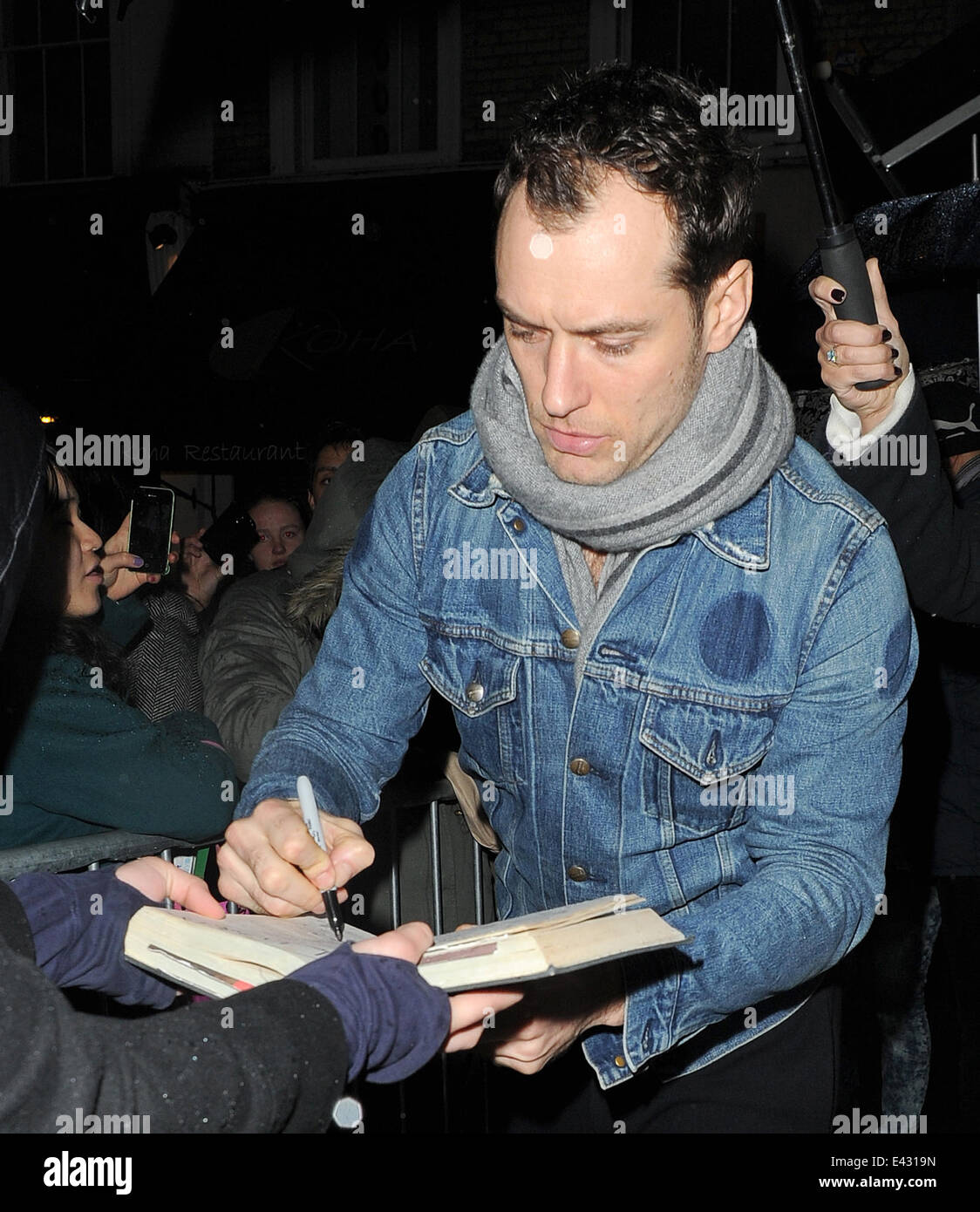 Jude Law leaving the Noel Coward Theatre in a denim jacket after his ...