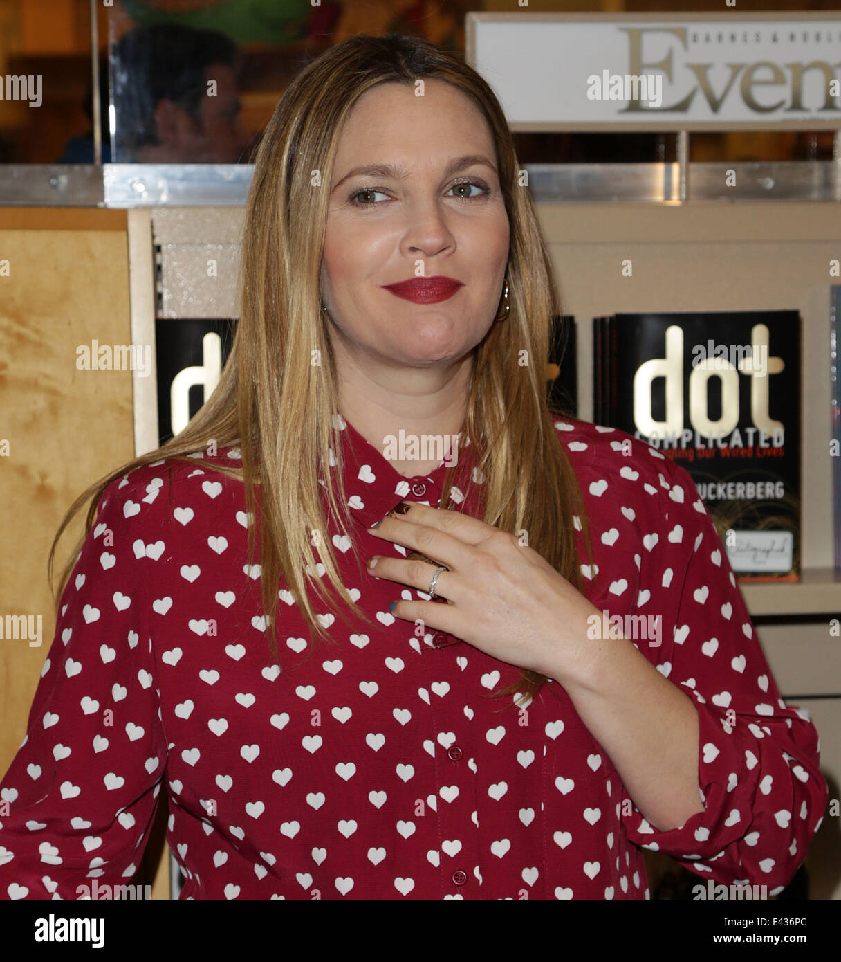 Actress Drew Barrymore poses at her book signing for "Find It In