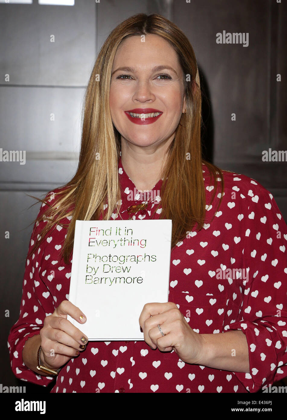 Actress Drew Barrymore poses at her book signing for "Find It In