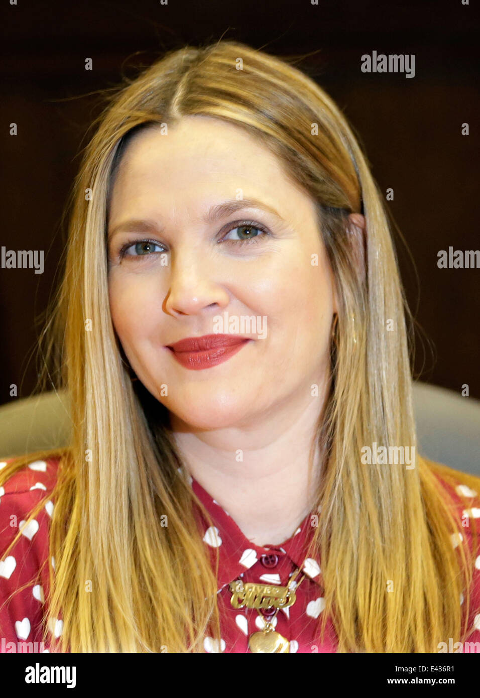 Actress Drew Barrymore poses at her book signing for "Find It In