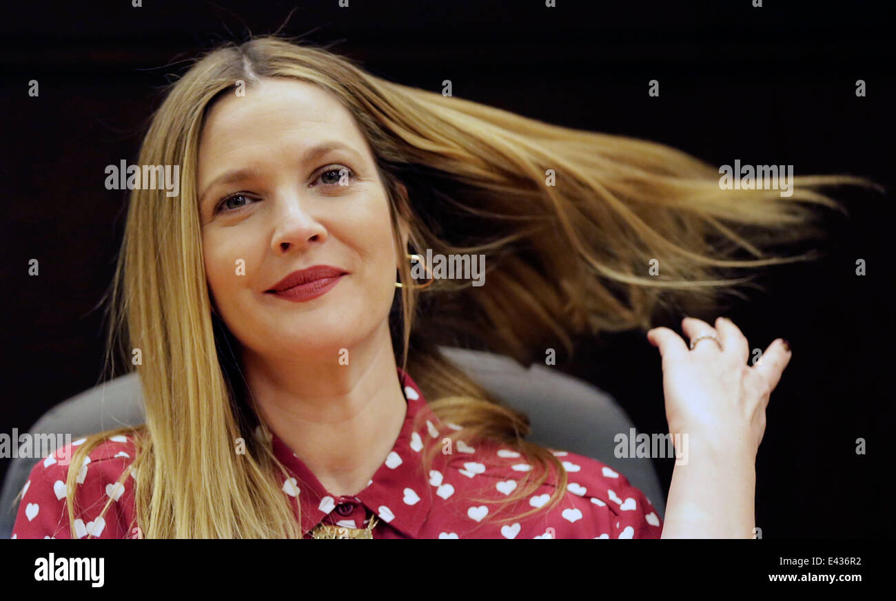 Actress Drew Barrymore poses at her book signing for "Find It In