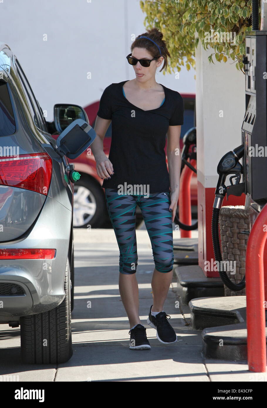 Ashley Greene pumping her own gas in Beverly Hills Featuring: Ashley