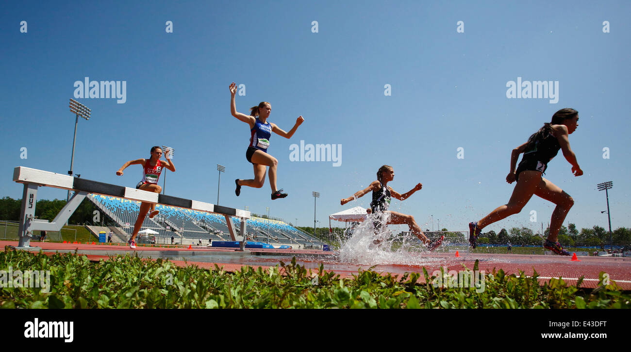 Competitors in the women's 3000meter steeplechase at the Canadian