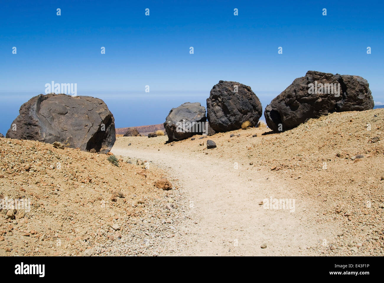 Accretion balls on the footpath to the summit of mount Teide, Tenerife, Canary Islands. Stock Photo