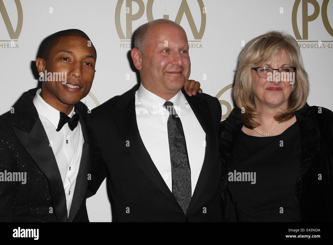 The 25th Annual Producer Guild of America Awards at The Beverly Hilton Hotel  Featuring: Pharrell Williams,Christopher Meledandri,Janet Healy Where: Beverly Hills, California, United States When: 19 Jan 2014 Stock Photo