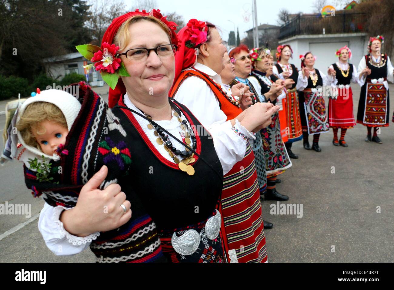 Bulgarian women dressed up for a carnival perform in celebration of the ...