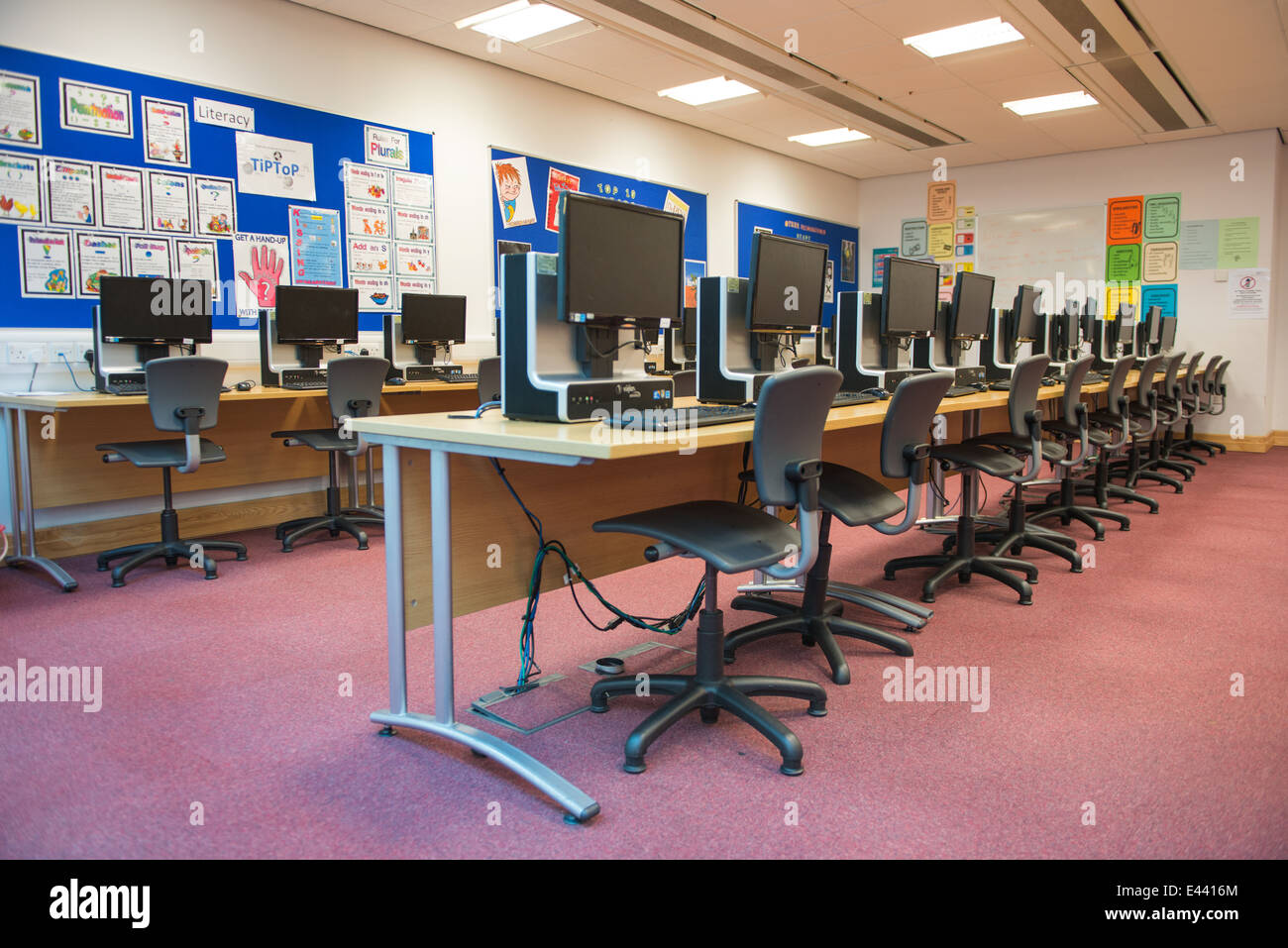 Computer cluster within school library Stock Photo - Alamy