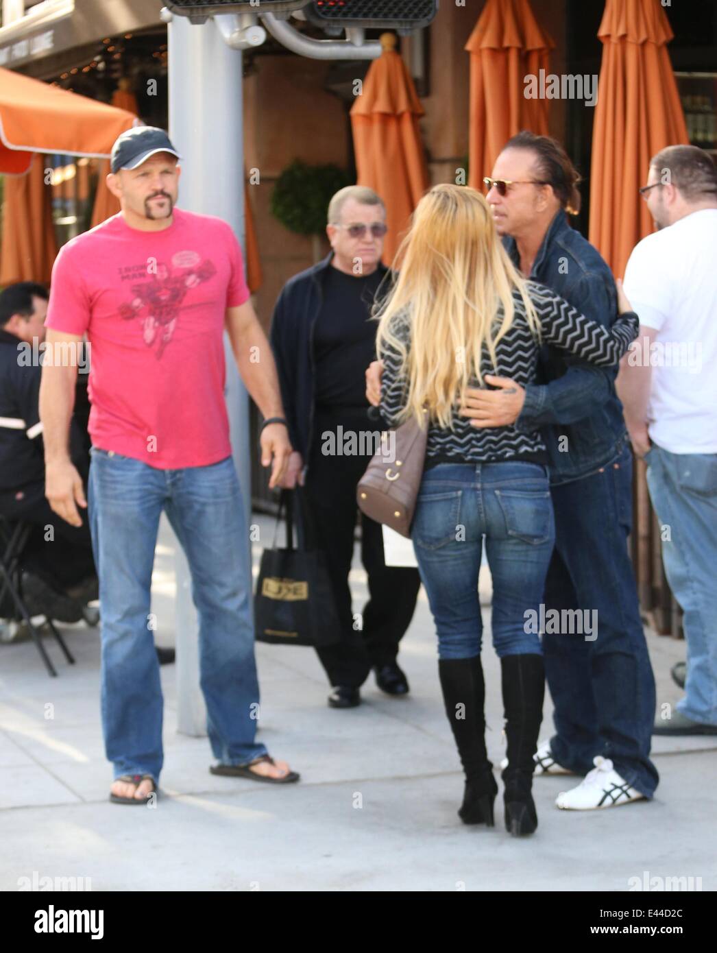Mickey Rourke has lunch with Chuck Liddell and his wife, Heidi at Via Alloro in Beverly Hills.  Featuring: Chuck Liddell,Mickey Rourke,Heidi Northcott Where: Los Angeles, California, United States When: 27 Jan 2014 Stock Photo