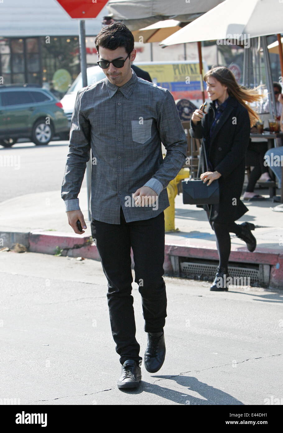 Joe Jonas with his girlfriend out for lunch in LA  Featuring: Joe Jonas,Blanda Eggenschwiler Where: Los Angeles, California, United States When: 27 Jan 2014 Stock Photo