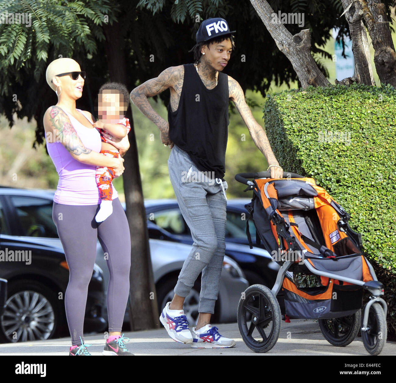 American rapper Wiz Khalifa takes his wife and son Sebastian on a hike ...