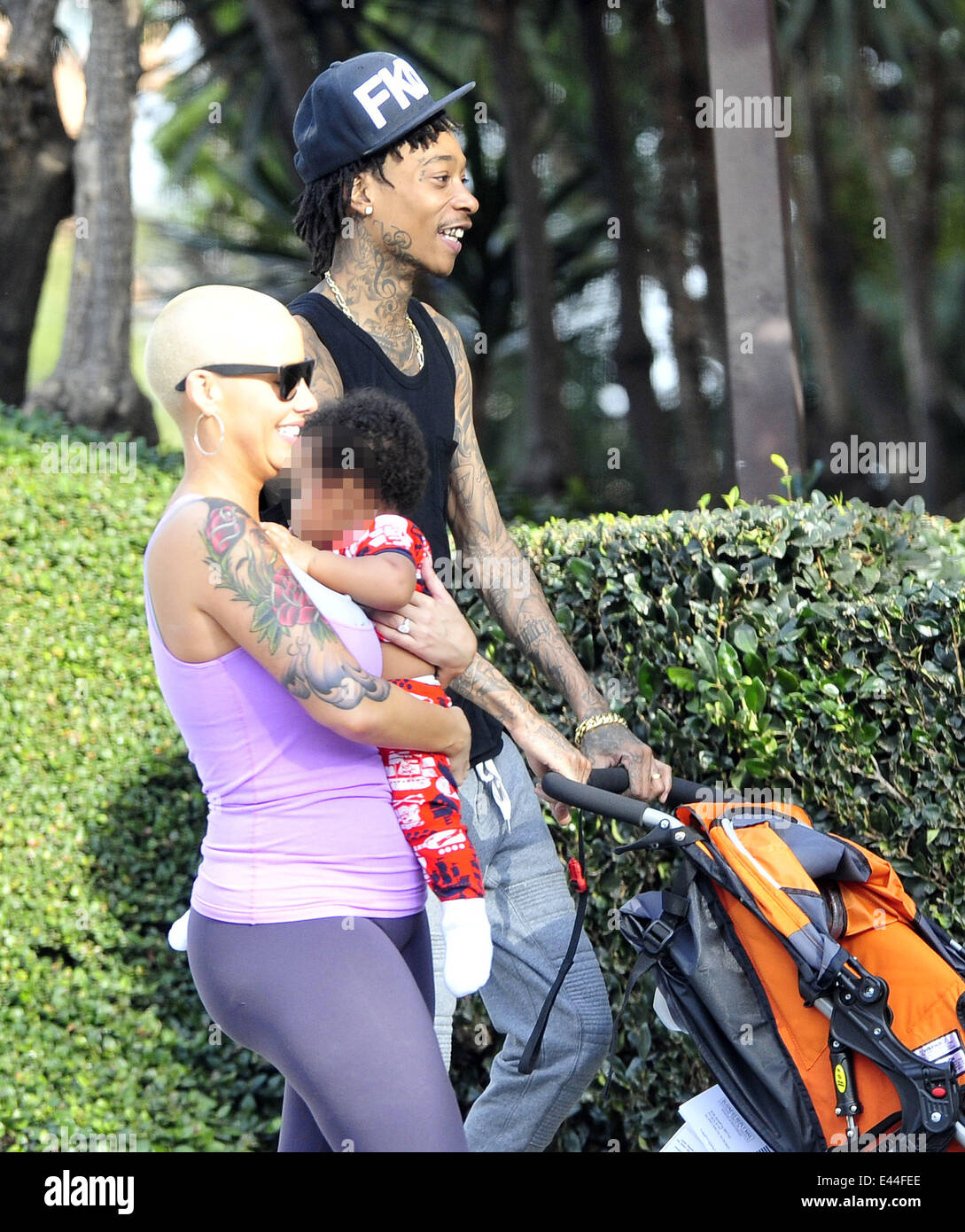 American rapper Wiz Khalifa takes his wife and son Sebastian on a hike ...