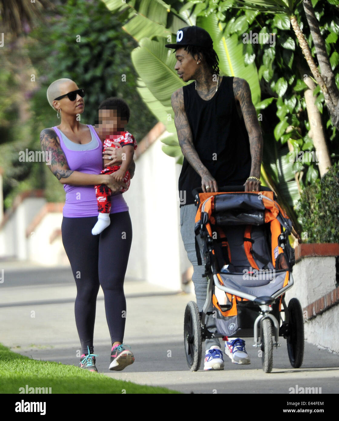 American rapper Wiz Khalifa takes his wife and son Sebastian on a hike ...