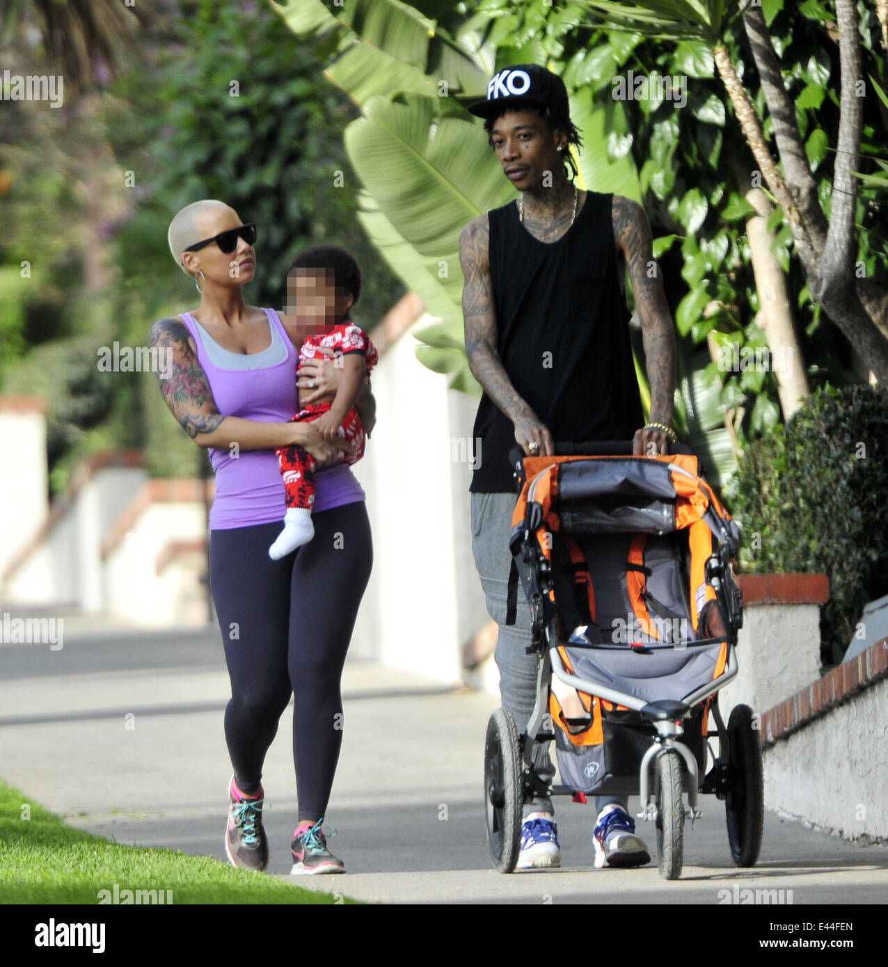 American rapper Wiz Khalifa takes his wife and son Sebastian on a hike ...
