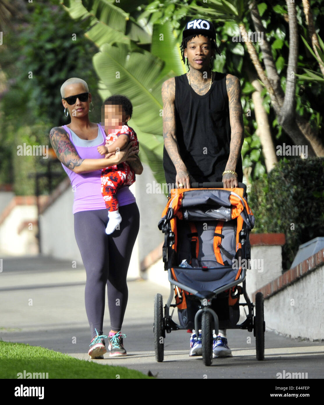 American rapper Wiz Khalifa takes his wife and son Sebastian on a hike ...