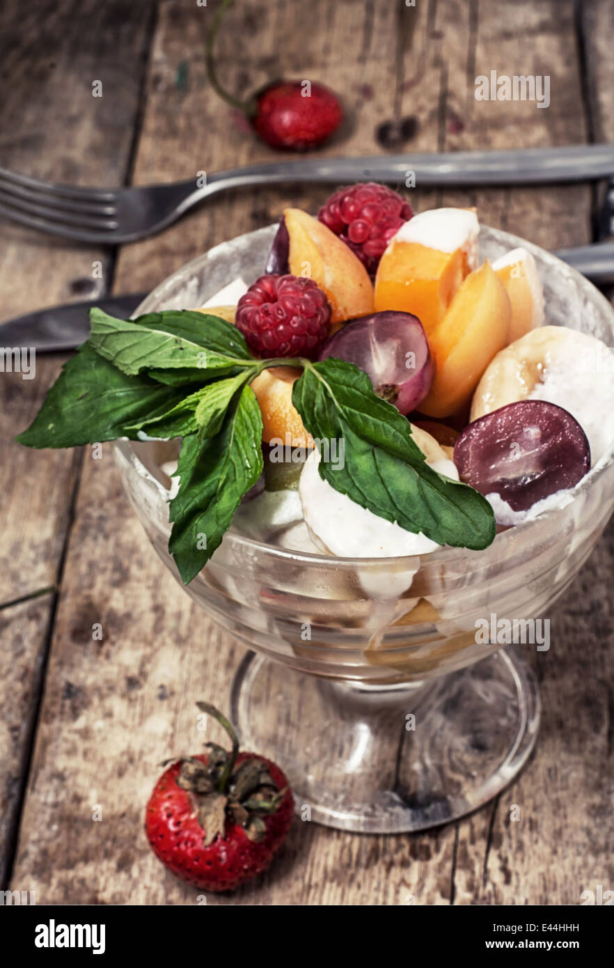 fruit salad is taste of fresh fruits and berries Stock Photo - Alamy