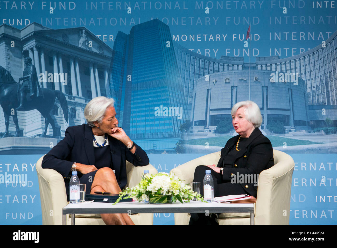 Washington DC, US. 2nd July, 2014. International Monetary Fund Managing Director Christine Lagarde, left, and Federal Reserve Chairwoman Janet Yellen, right, participate in the Inaugural Michel Camdessus Central Banking Lecture on financial stability at the IMF Headquarters in downtown Washington, DC on July 2, 2014. Credit:  Kristoffer Tripplaar/Alamy Live News Stock Photo