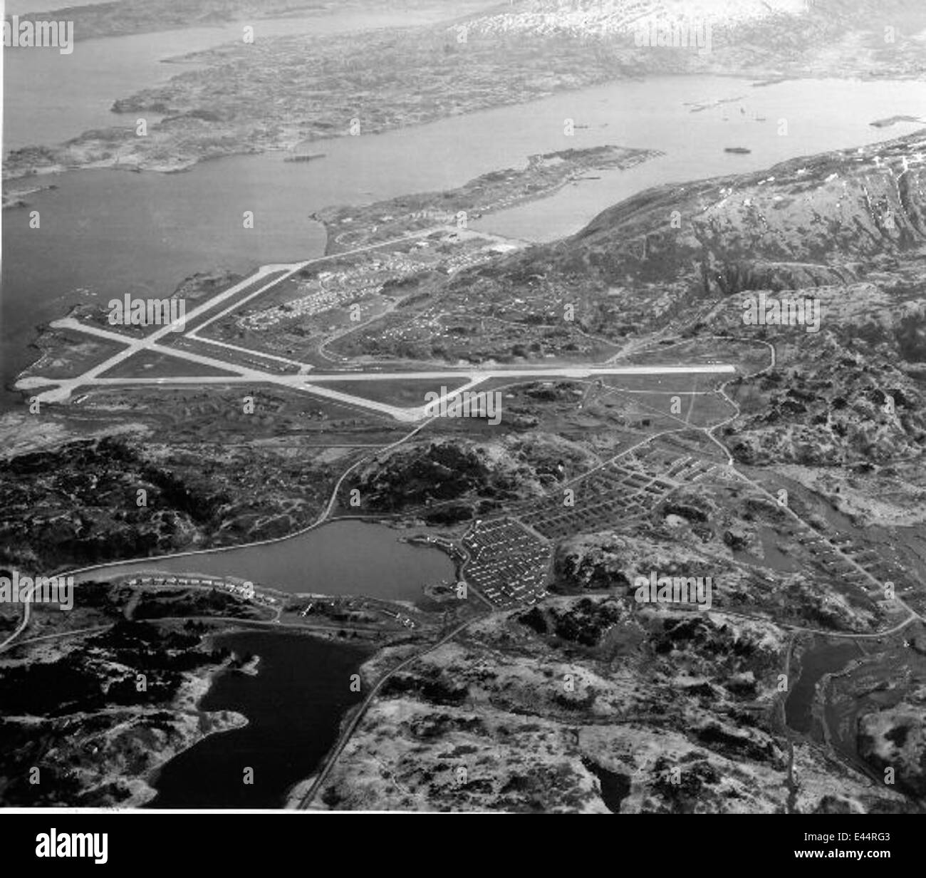 A photograph of Naval Station Kodiak in 1952, showcasing the U.S. Navy ...