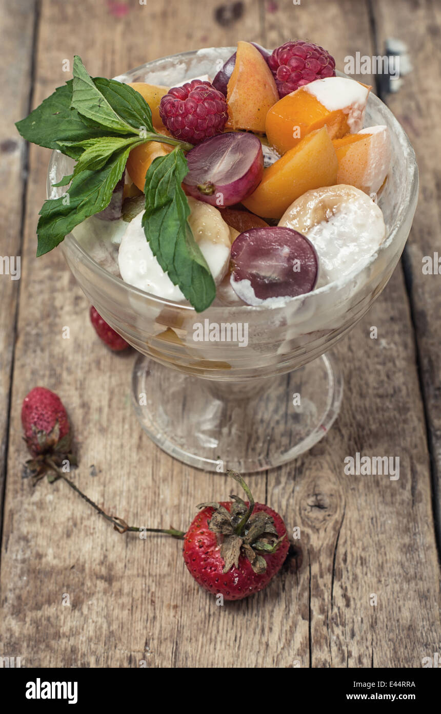 fruit salad is taste of fresh fruits and berries Stock Photo - Alamy