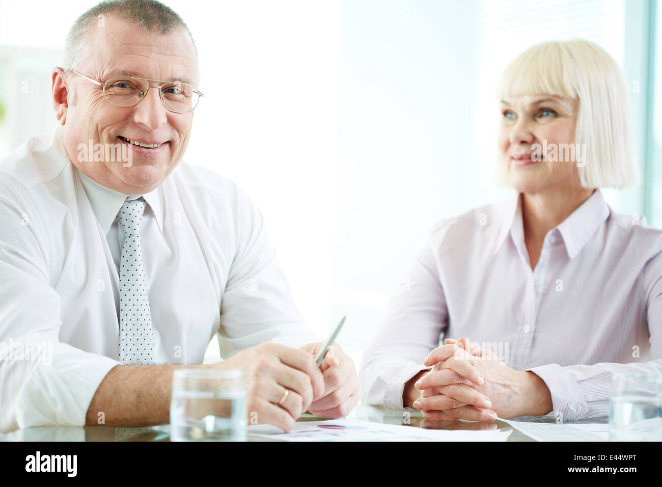 Male boss smiling at woman hi-res stock photography and images - Alamy