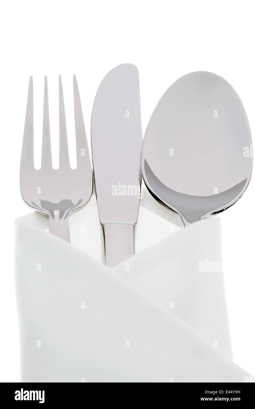 A knife with a fork and plate. Place setting for a dinner at the ...