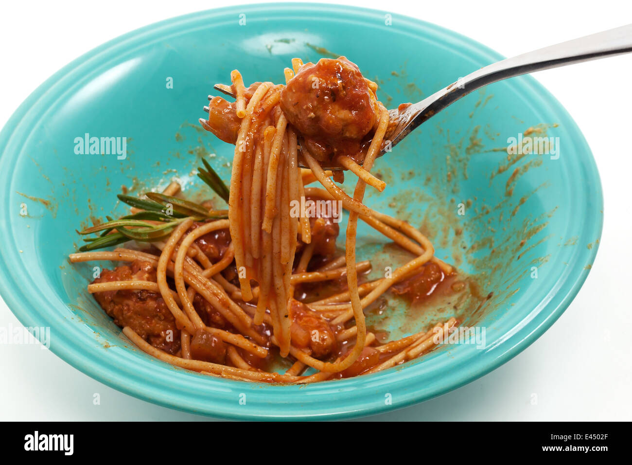 Eating spaghetti and meatballs with fork Stock Photo Alamy