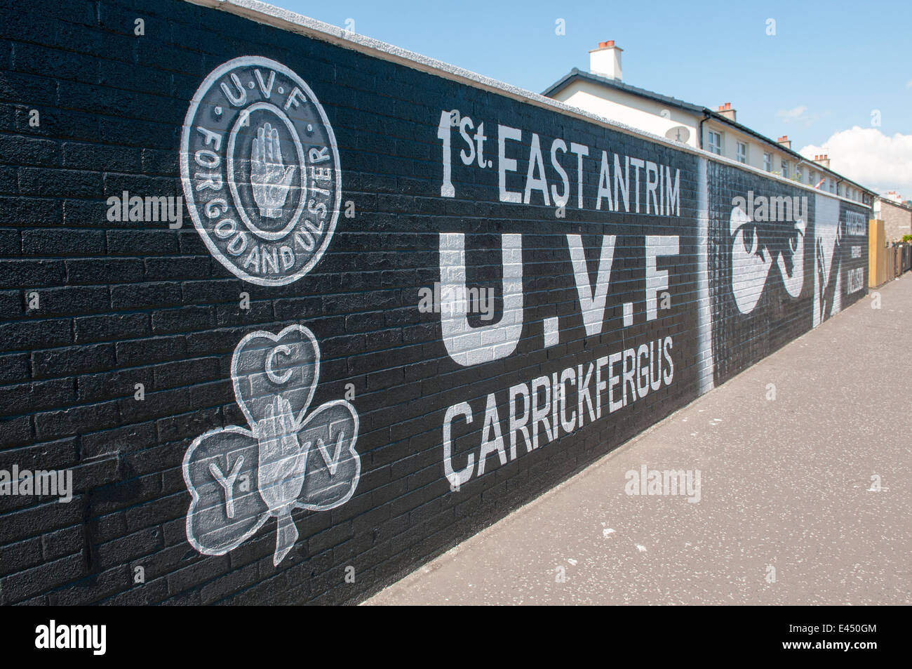 Mural on a wall in Carrickfergus '1st East Antrim UVF, Carrickfergus' Stock Photo