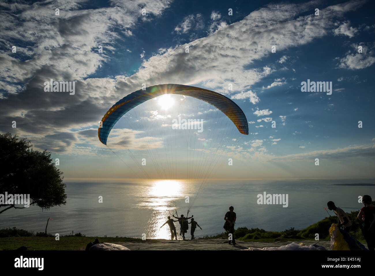 Paraglider at the start to a tandem jump, hang on Signal Hill, Cape Town, Western Cape, South Africa Stock Photo