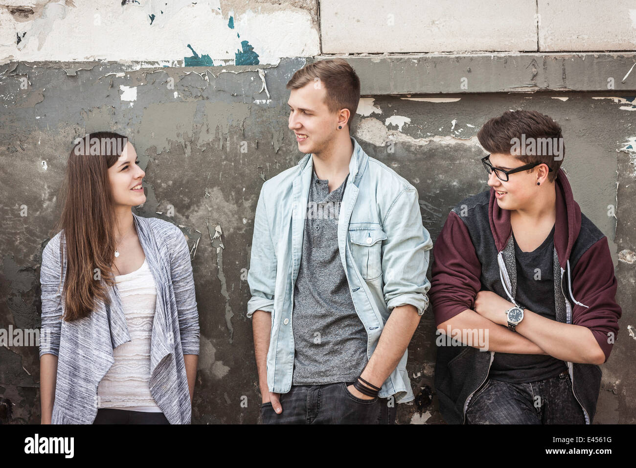 Teenagers hanging out at abandoned building Stock Photo