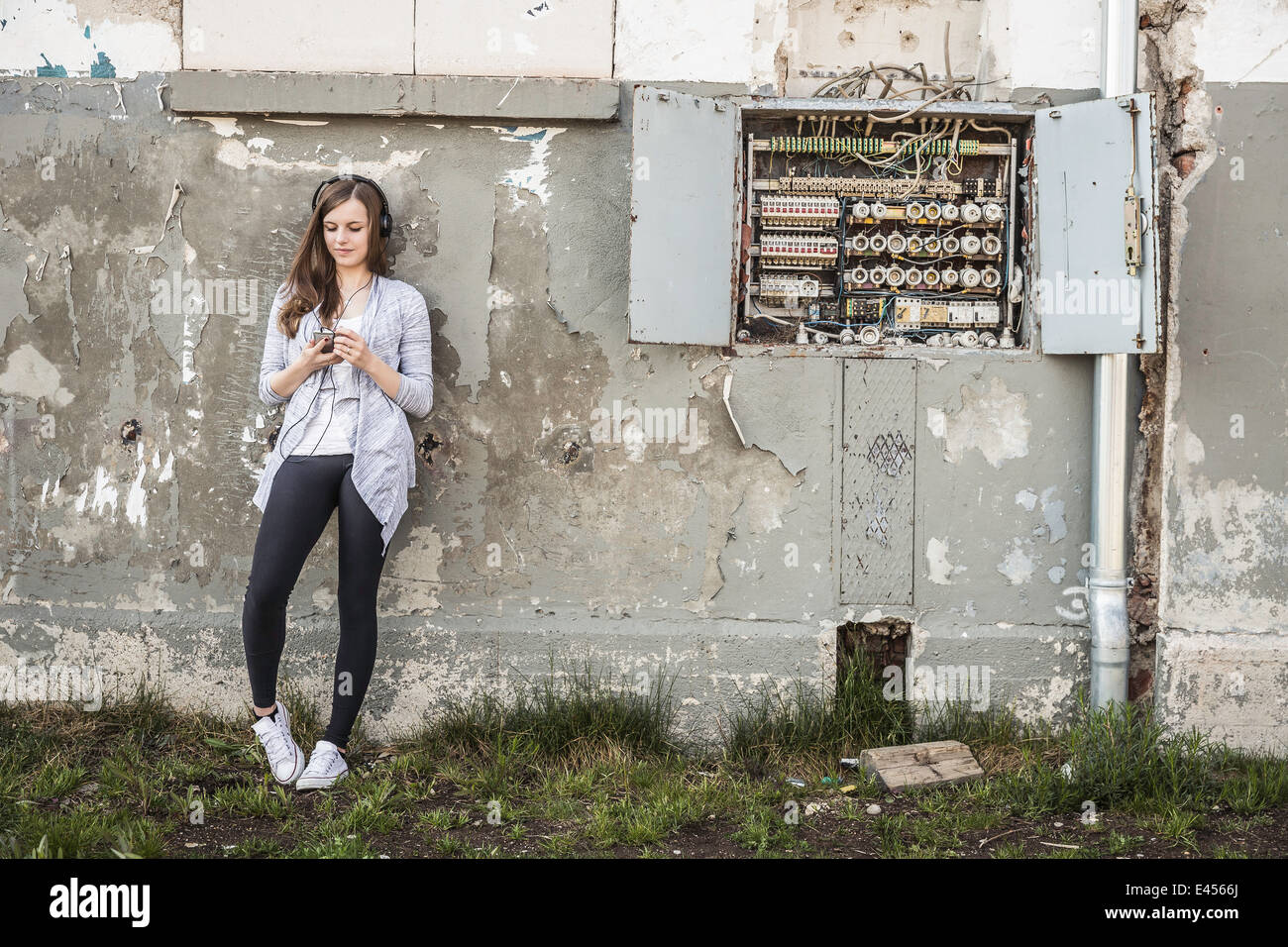 Teenage girl hanging out at abandoned building Stock Photo Alamy