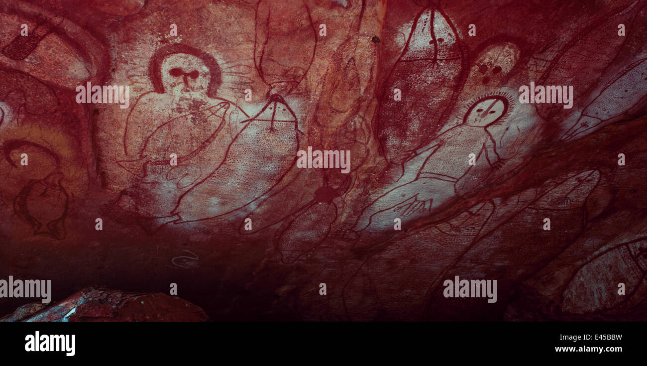 Ancient aboriginal Wandjina rock art in cave, Bigge Island, Western Australia Stock Photo
