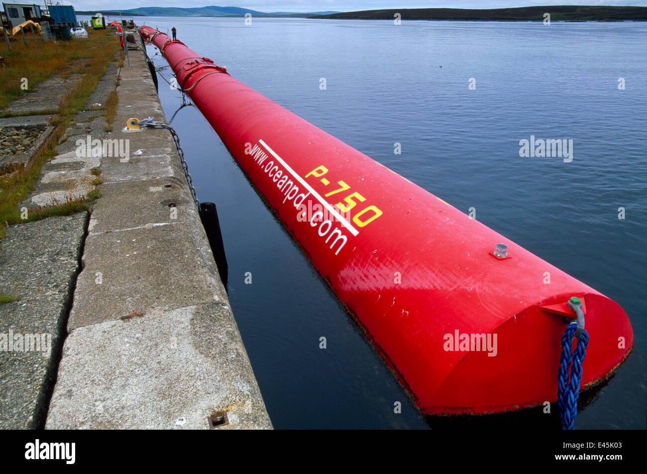 Pelamis wave energy convertor moored by Lyness Pier, Hoy, Orkney, Scotland, July Stock Photo